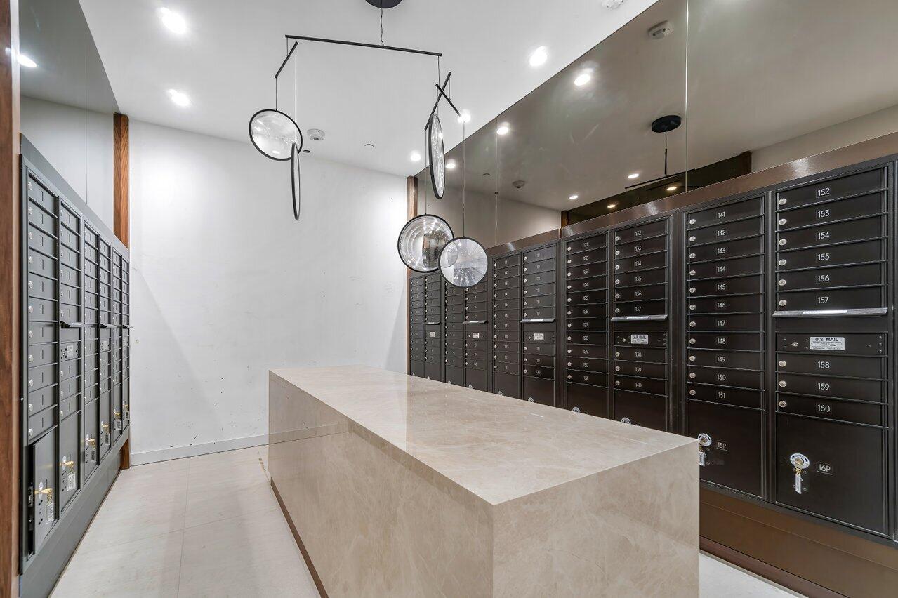 220 Southeast Mizner Boulevard, Unit 506 Boca Raton, FL 33432 - Photo 48 of 64 a very nice looking room with wooden floor