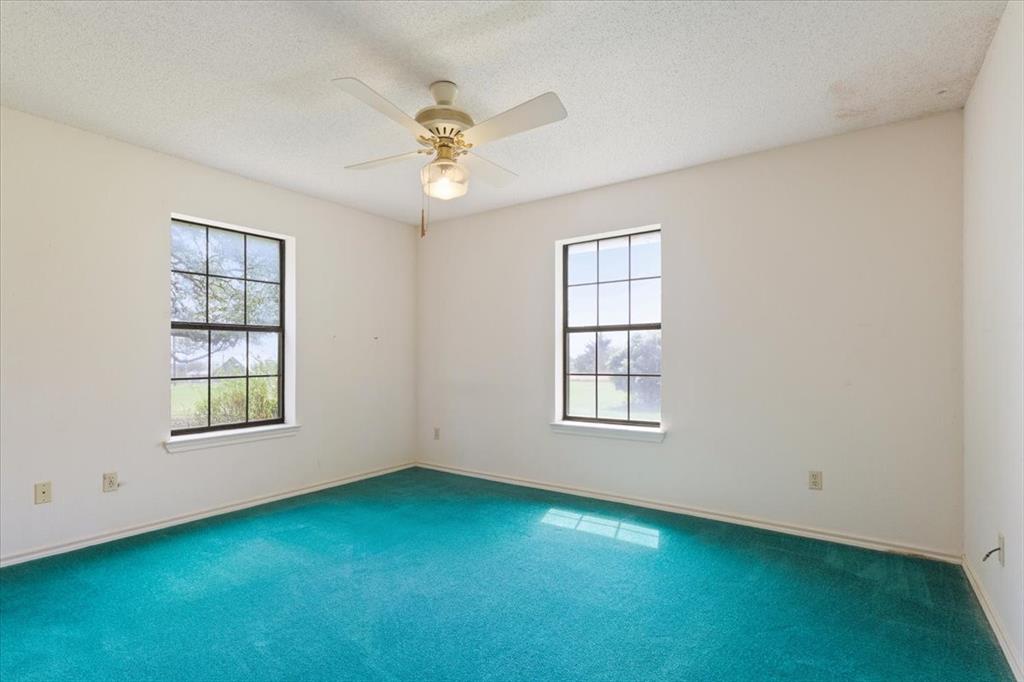 146 Indian Paint Brush Road Eddy, TX 76524 - Photo 26 of 38 an empty room with windows
