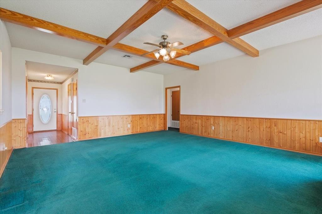 146 Indian Paint Brush Road Eddy, TX 76524 - Photo 10 of 38 a view of empty room with wooden floor
