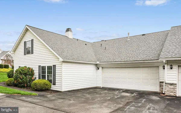 a view of a house with garage