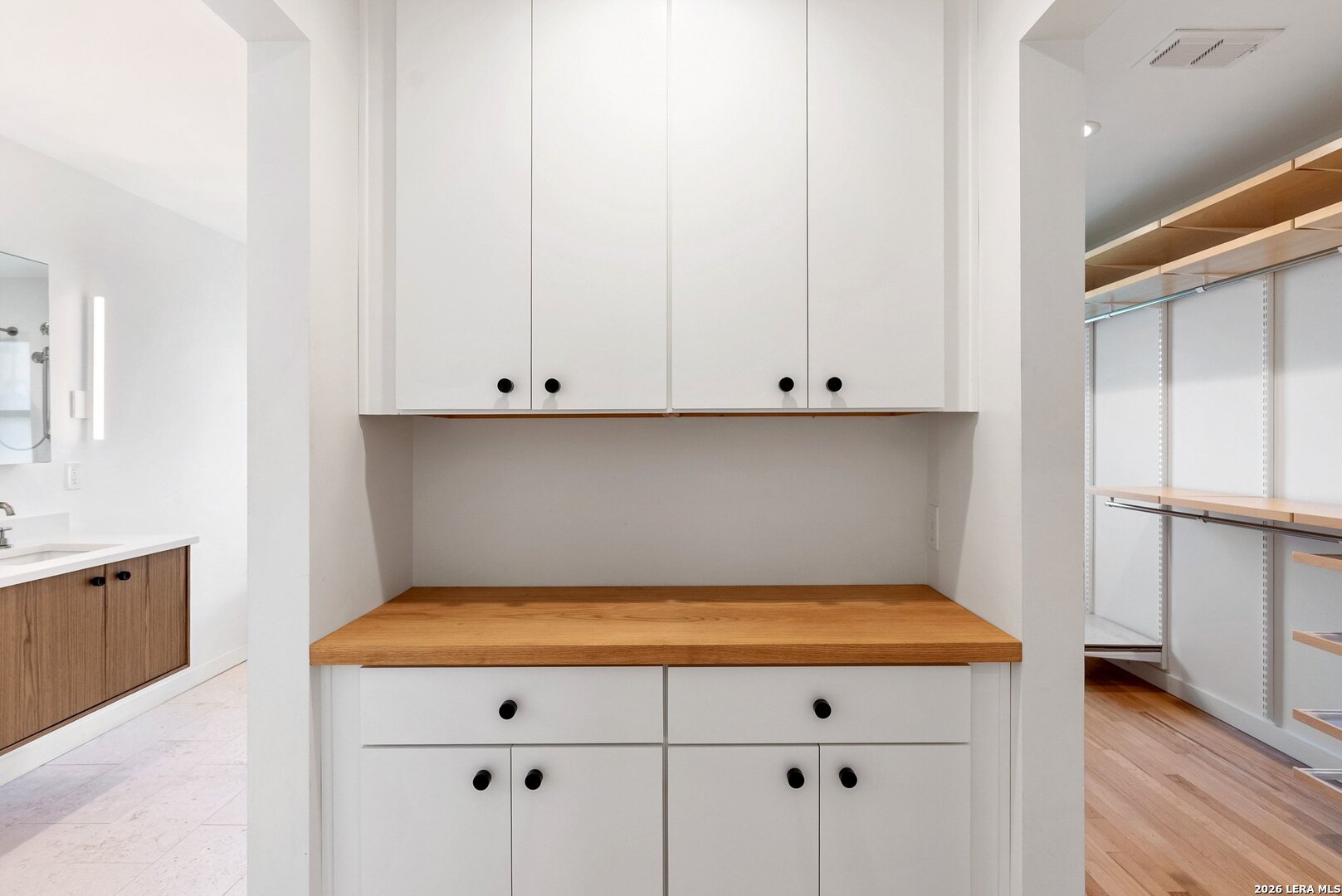 1402 Hutto Road Georgetown, TX 78626 - Photo 25 of 34 a view of a kitchen with white cabinets