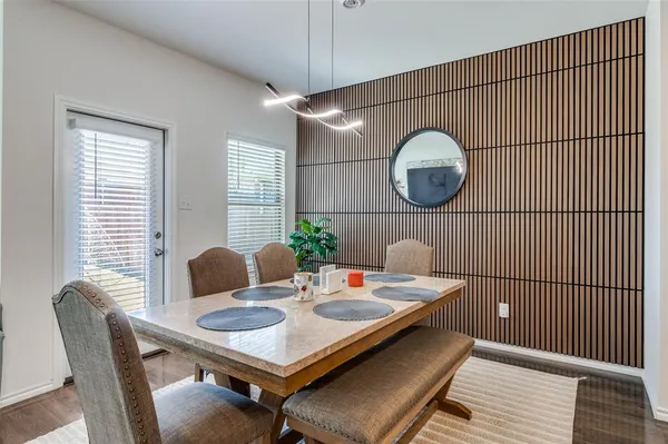 a kitchen with stainless steel appliances granite countertop a sink and a stove