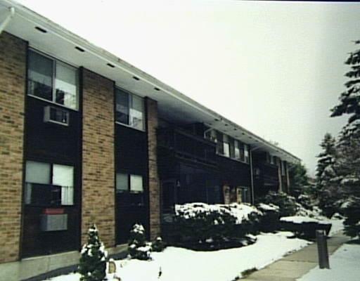 154 Cold Spring Road, Unit 13 Stamford, CT 06905 - Photo 1 of 1 a front view of a house