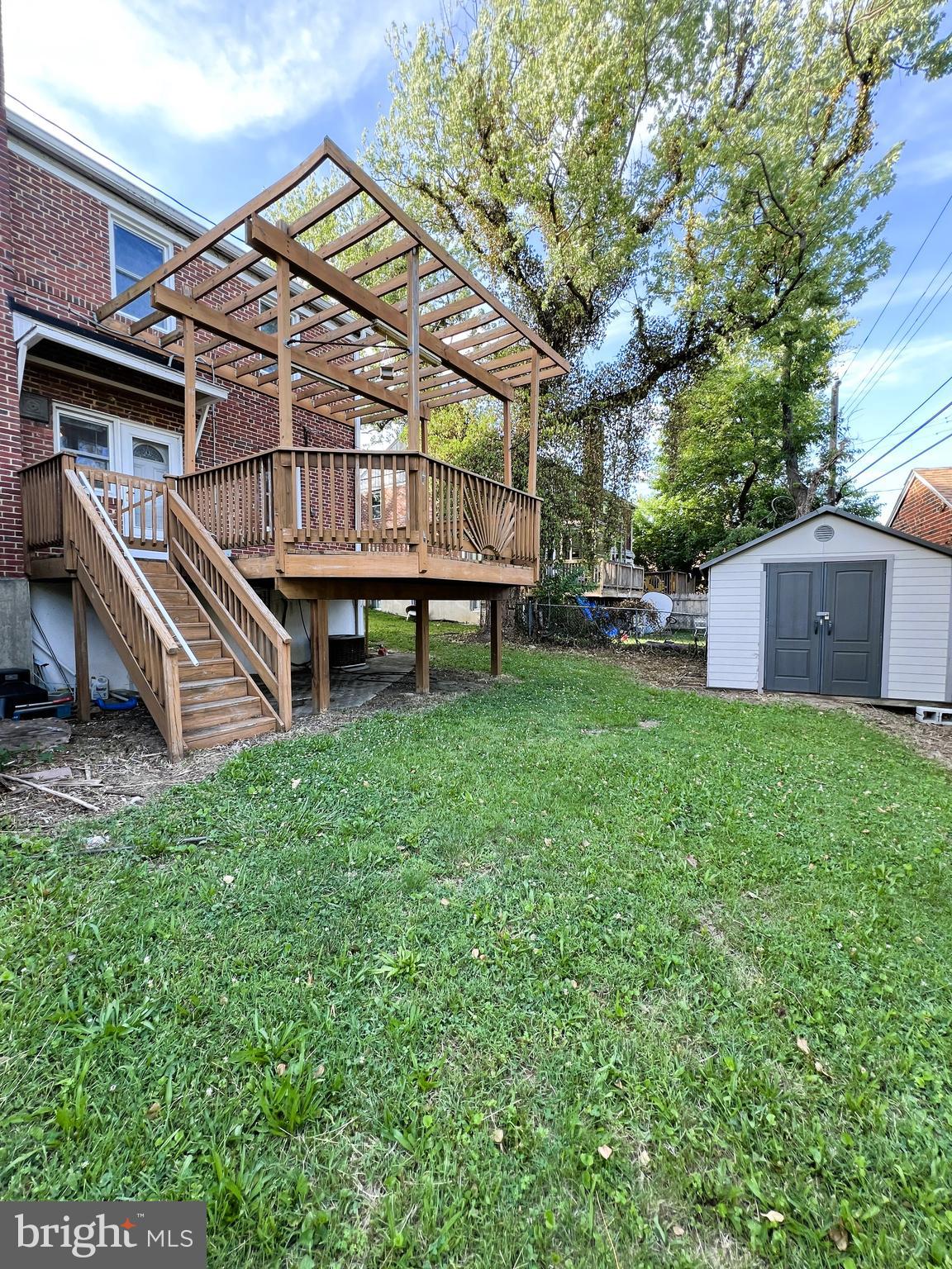 3705 Bancroft Road Baltimore, MD 21215 - Photo 44 of 50 a view of a house with a yard and sitting area
