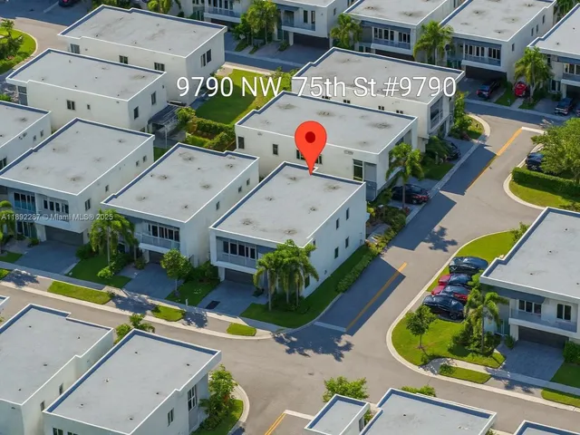 a swimming pool with outdoor seating and yard