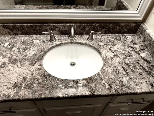 a view of a wooden floor and a floor to ceiling window