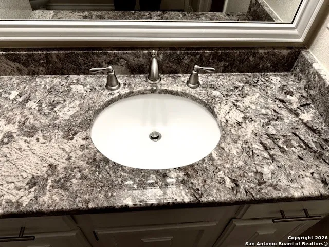 a view of a wooden floor and a floor to ceiling window