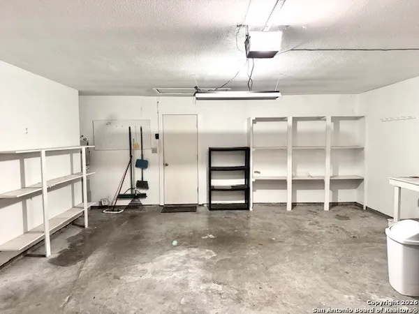 a view of a room with shelves