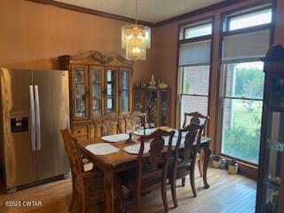 3643 Mt Carmel Road Decaturville, TN 38329 - Photo 19 of 71 a view of a dining room with furniture window and wooden floor
