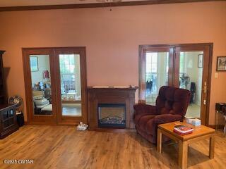3643 Mt Carmel Road Decaturville, TN 38329 - Photo 26 of 71 a living room with furniture a fireplace and a flat screen tv