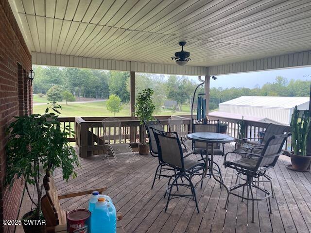 3643 Mt Carmel Road Decaturville, TN 38329 - Photo 36 of 71 a outdoor dining space with furniture and garden view