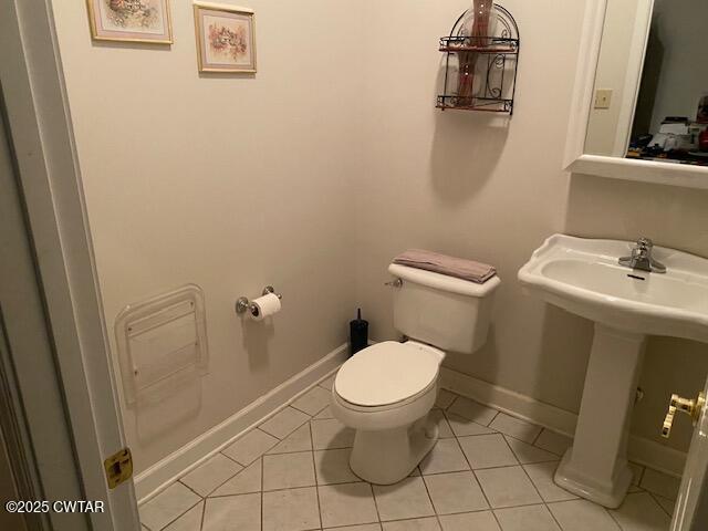 3643 Mt Carmel Road Decaturville, TN 38329 - Photo 46 of 71 a bathroom with a toilet and a sink