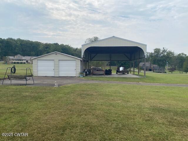 3643 Mt Carmel Road Decaturville, TN 38329 - Photo 53 of 71 a house view with a garden space