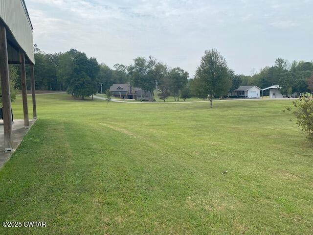 3643 Mt Carmel Road Decaturville, TN 38329 - Photo 58 of 71 a view of a green field