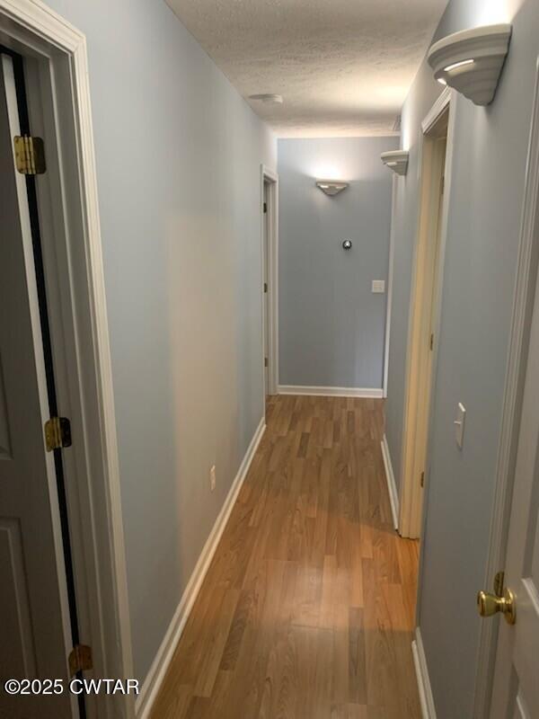 314 Cheyenne Circle Lexington, TN 38351 - Photo 8 of 26 a view of a hallway with wooden floor