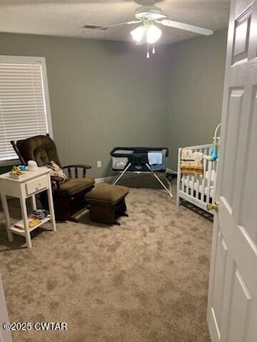 314 Cheyenne Circle Lexington, TN 38351 - Photo 9 of 26 a bedroom with a bed and a chandelier