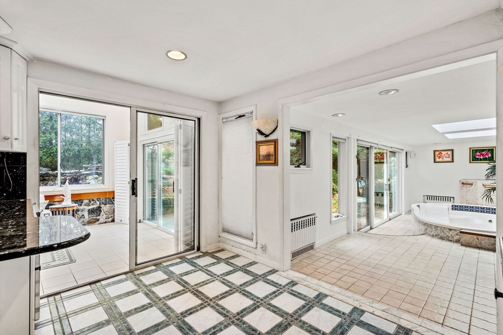 10 Quadrant Road Salem, MA 01970 - Photo 13 of 42 a spacious bedroom with a large bed and a window