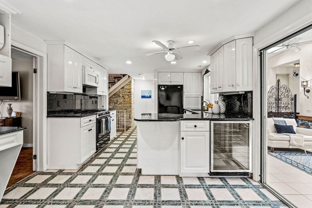 10 Quadrant Road Salem, MA 01970 - Photo 15 of 42 a kitchen with stainless steel appliances and cabinets