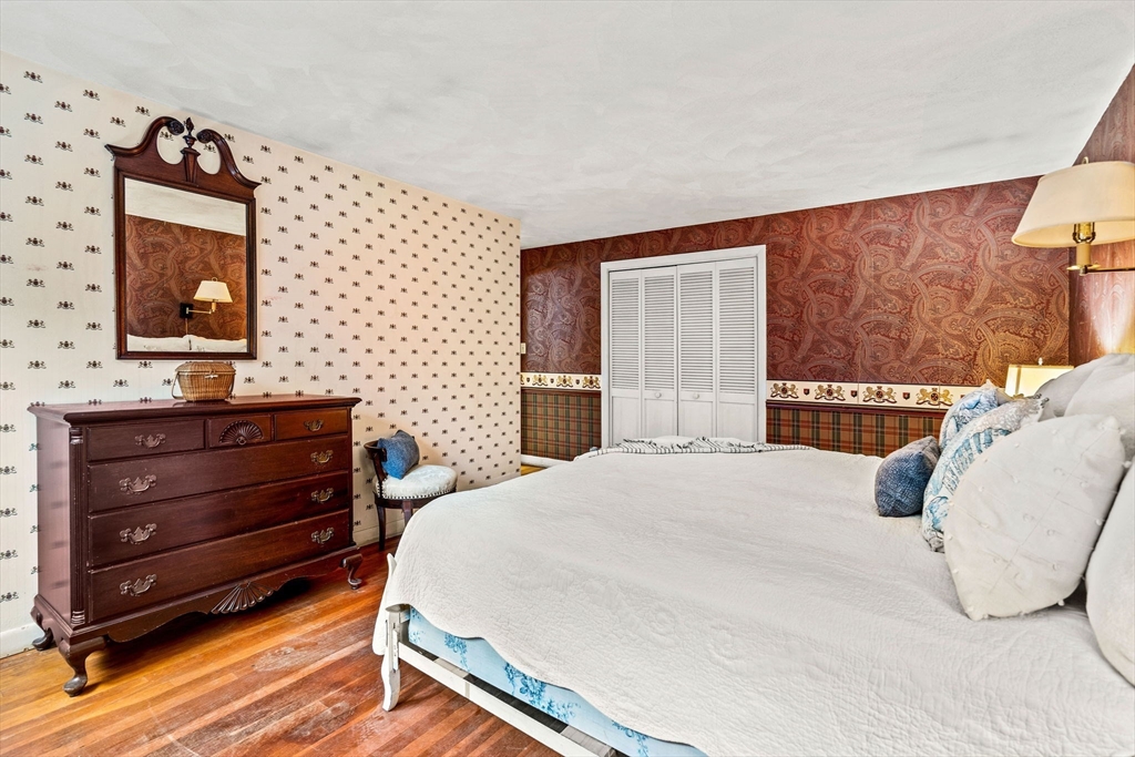 10 Quadrant Road Salem, MA 01970 - Photo 30 of 42 a bedroom with a bed and a flat screen tv