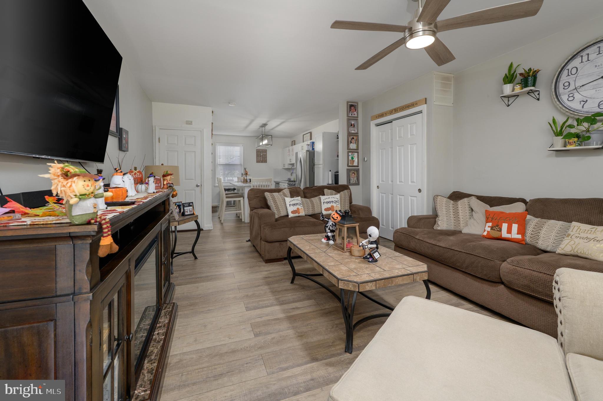 103 Middlesex Street Gloucester City, NJ 08030 - Photo 2 of 31 a living room with furniture and a flat screen tv