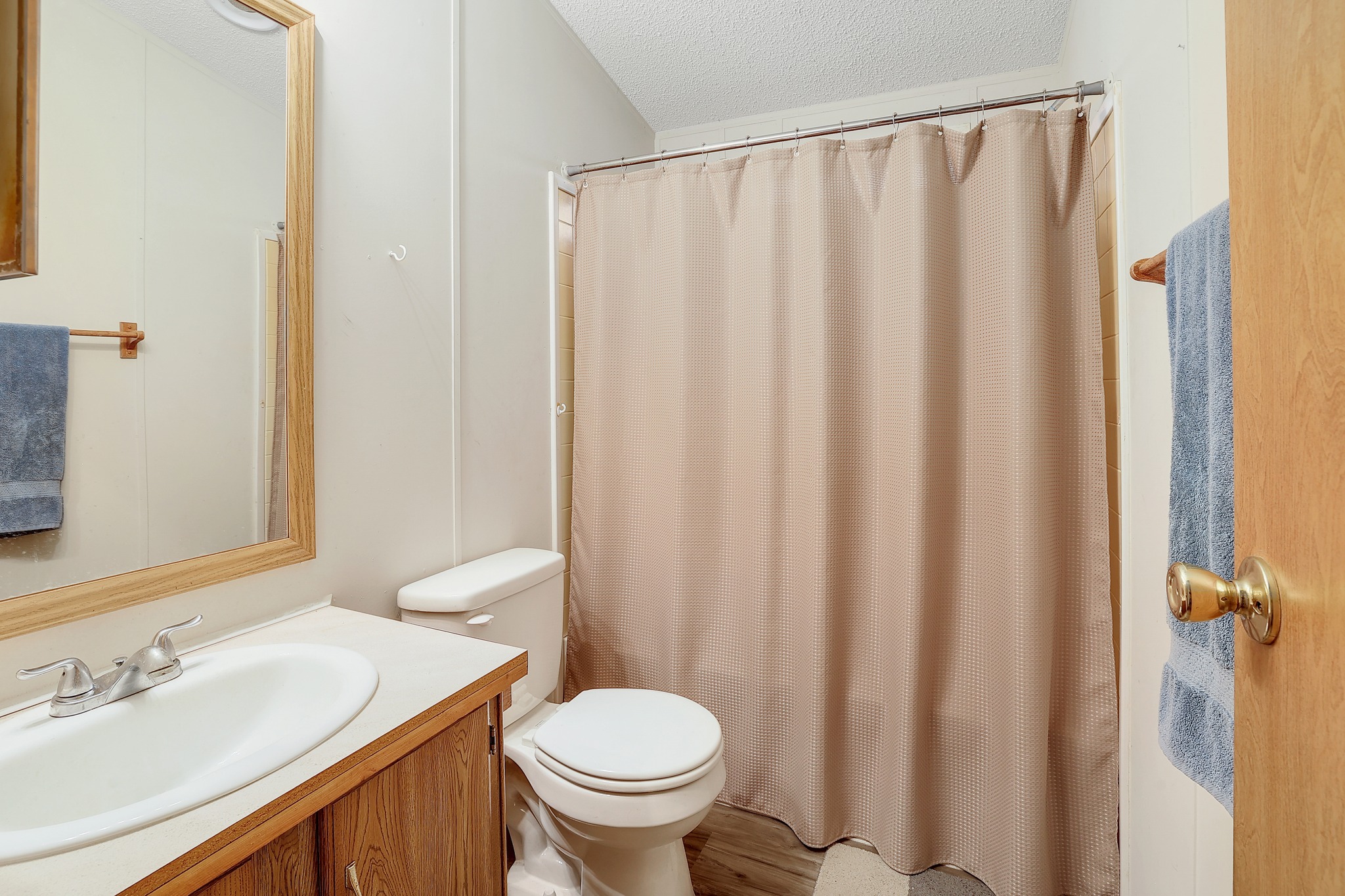 288 The Forest Road Dale, TX 78616 - Photo 19 of 31 a bathroom with a sink and a mirror