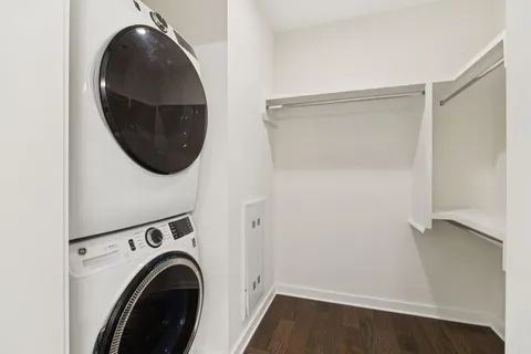 a view of livingroom with washer and dryer