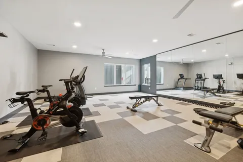 a view of a room with gym equipment