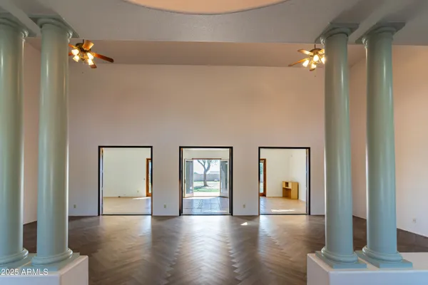 a bathroom with a granite countertop sink a mirror and vanity