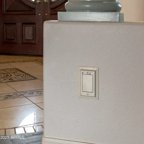 a bathroom with a tub and window