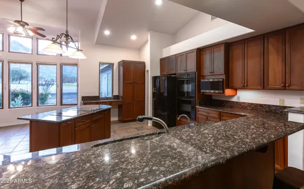 a view of a backyard of a house