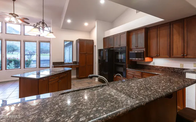 a view of a backyard of a house