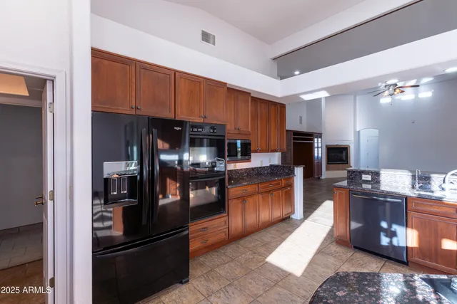 a view of a pathway both of a house with a yard