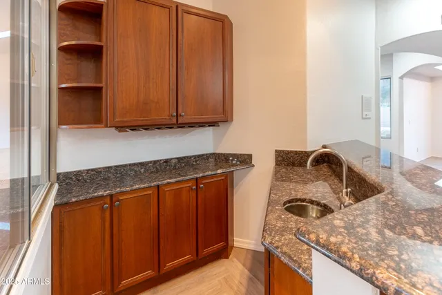 a view of a town with mountains in the background