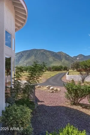 a kitchen with granite countertop a sink and a stove top oven