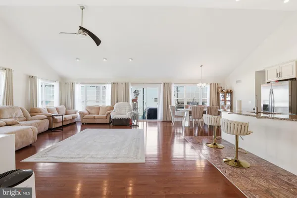 a living room with furniture and a table