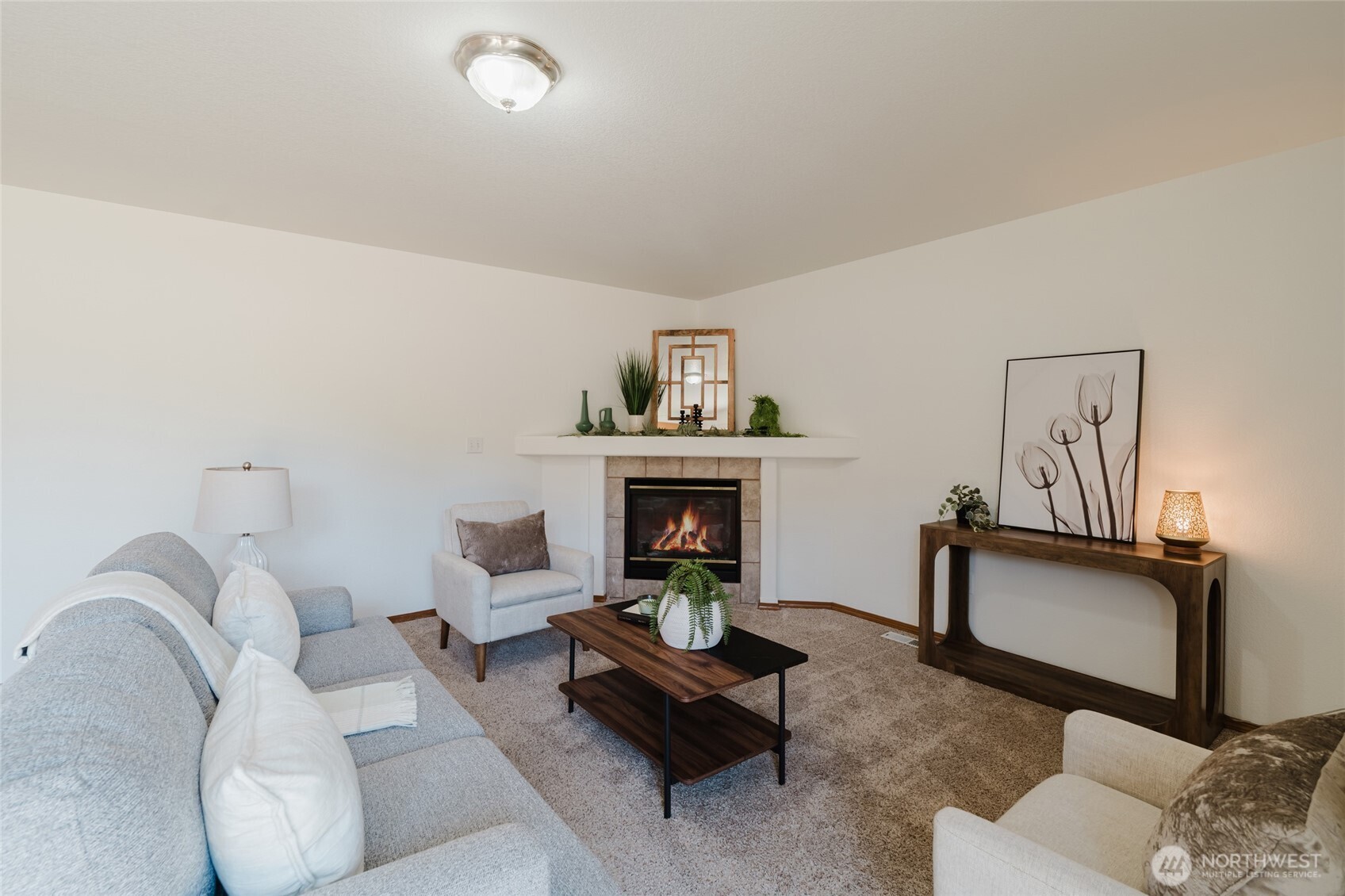 9519 184th Avenue Southwest Rochester, WA 98579 - Photo 16 of 38 a living room with furniture and a fireplace