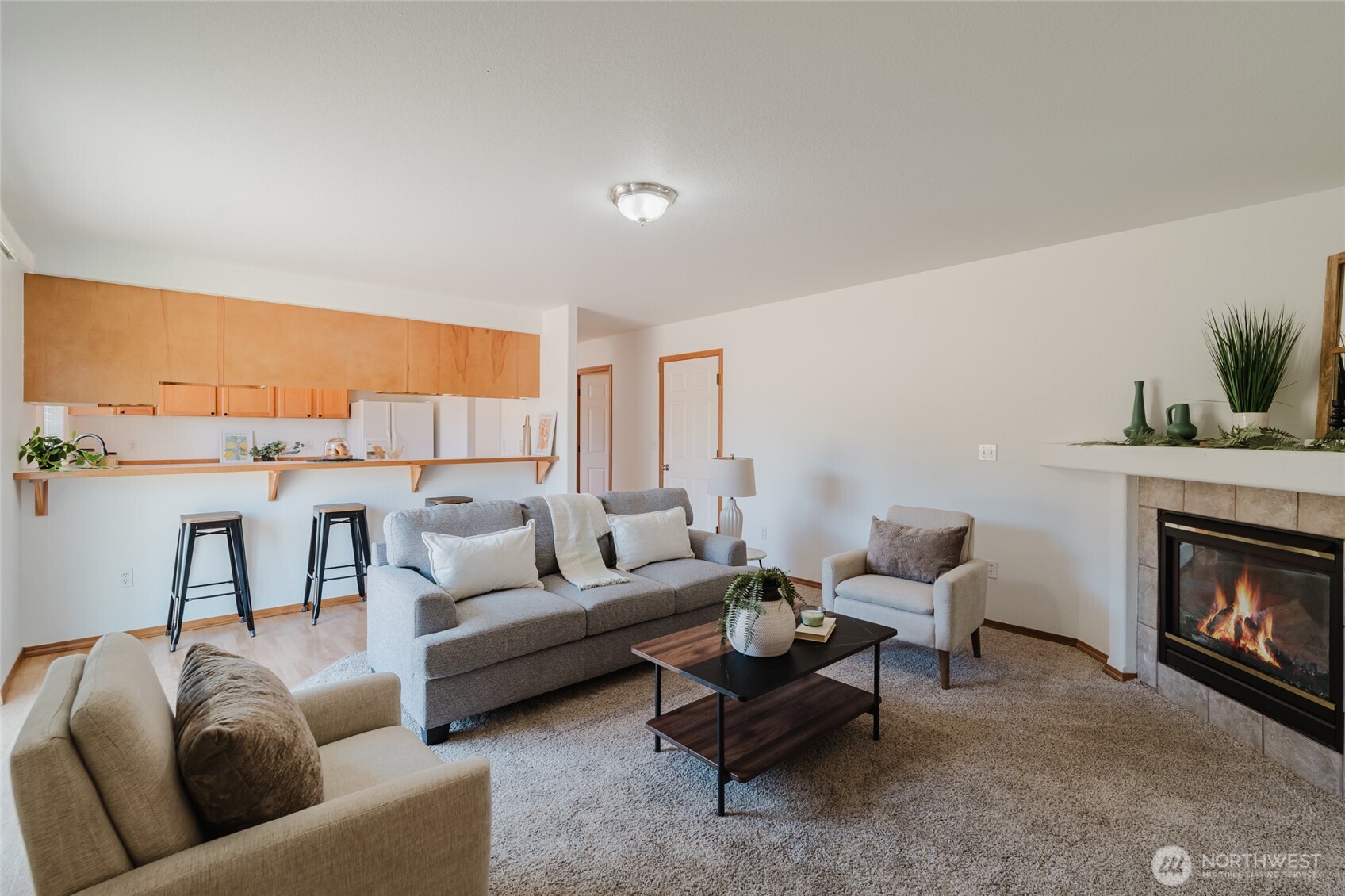 9519 184th Avenue Southwest Rochester, WA 98579 - Photo 17 of 38 a living room with furniture and a fireplace