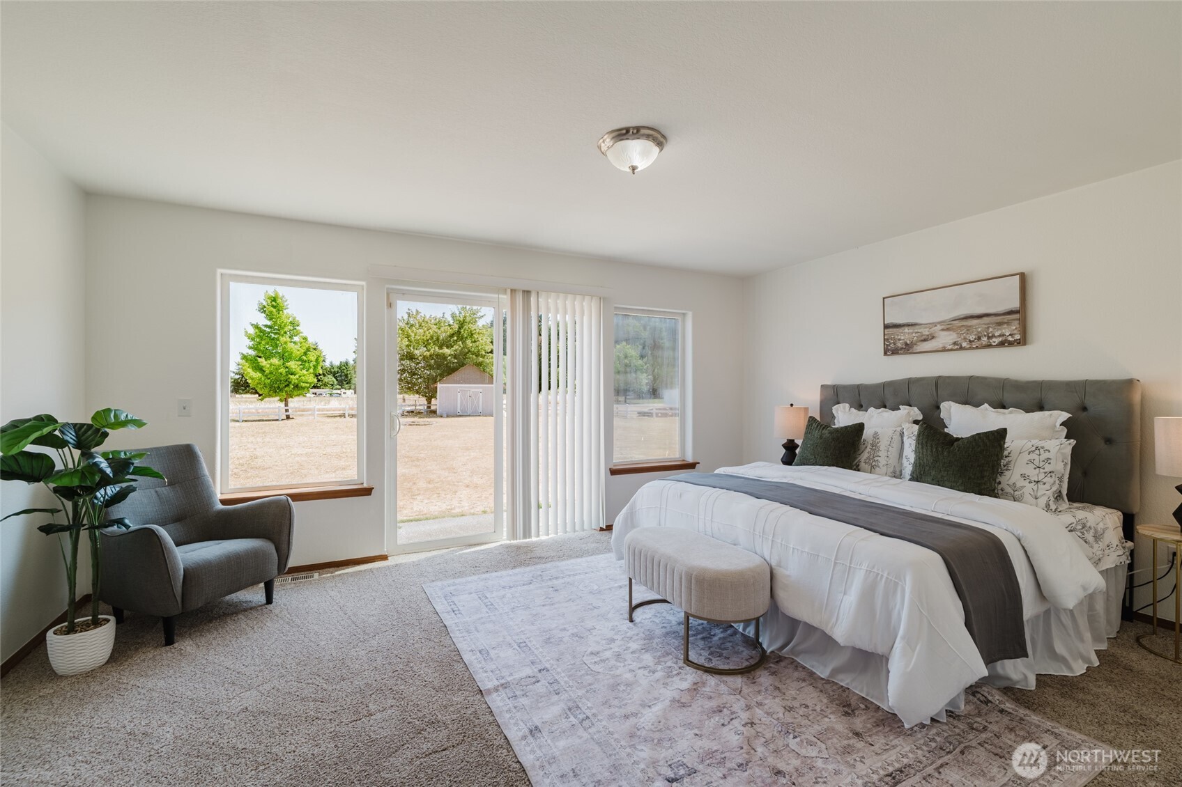 9519 184th Avenue Southwest Rochester, WA 98579 - Photo 19 of 38 a spacious bedroom with a bed and a couch