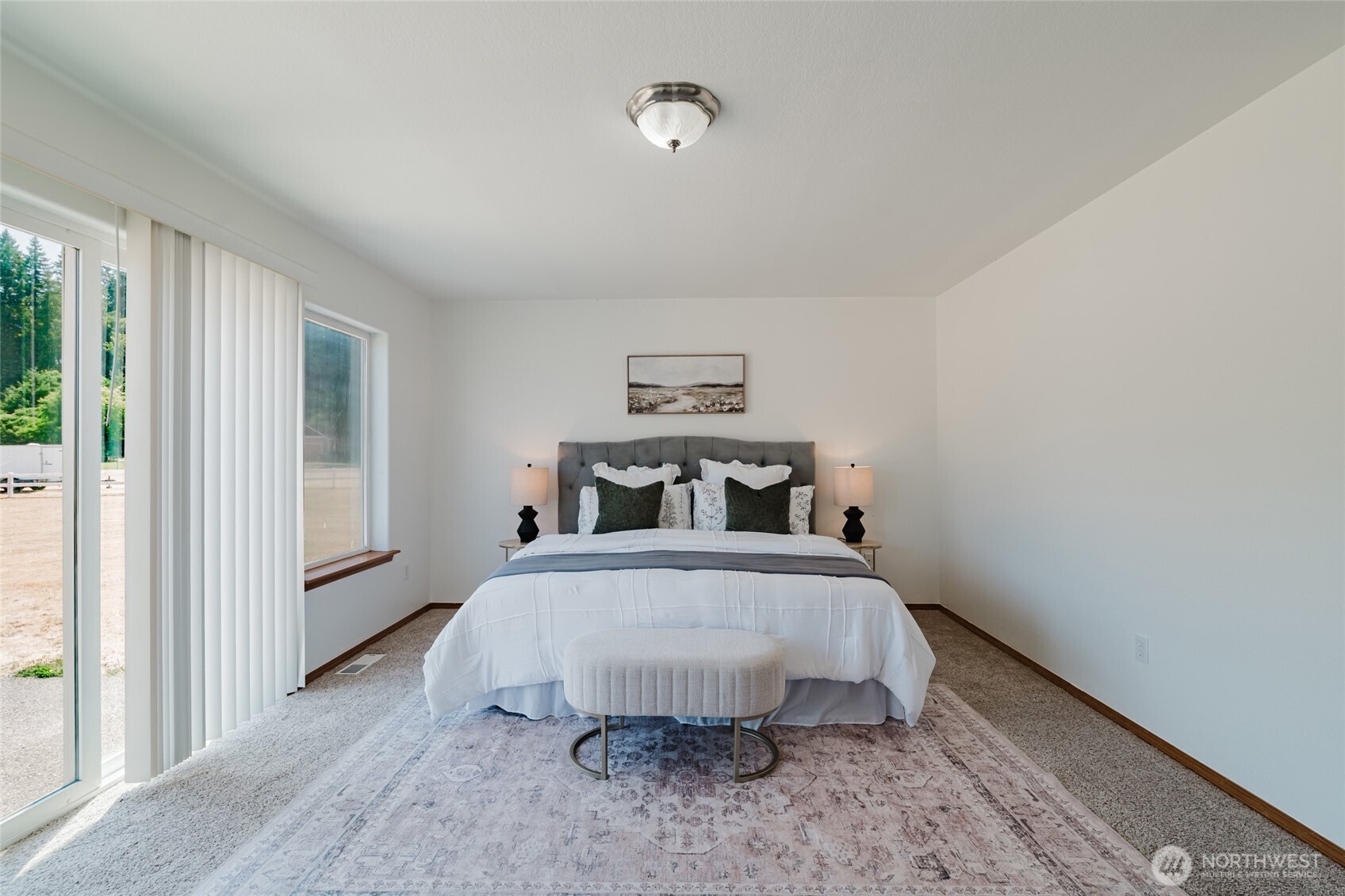 9519 184th Avenue Southwest Rochester, WA 98579 - Photo 20 of 38 a bedroom with a bed and a large window