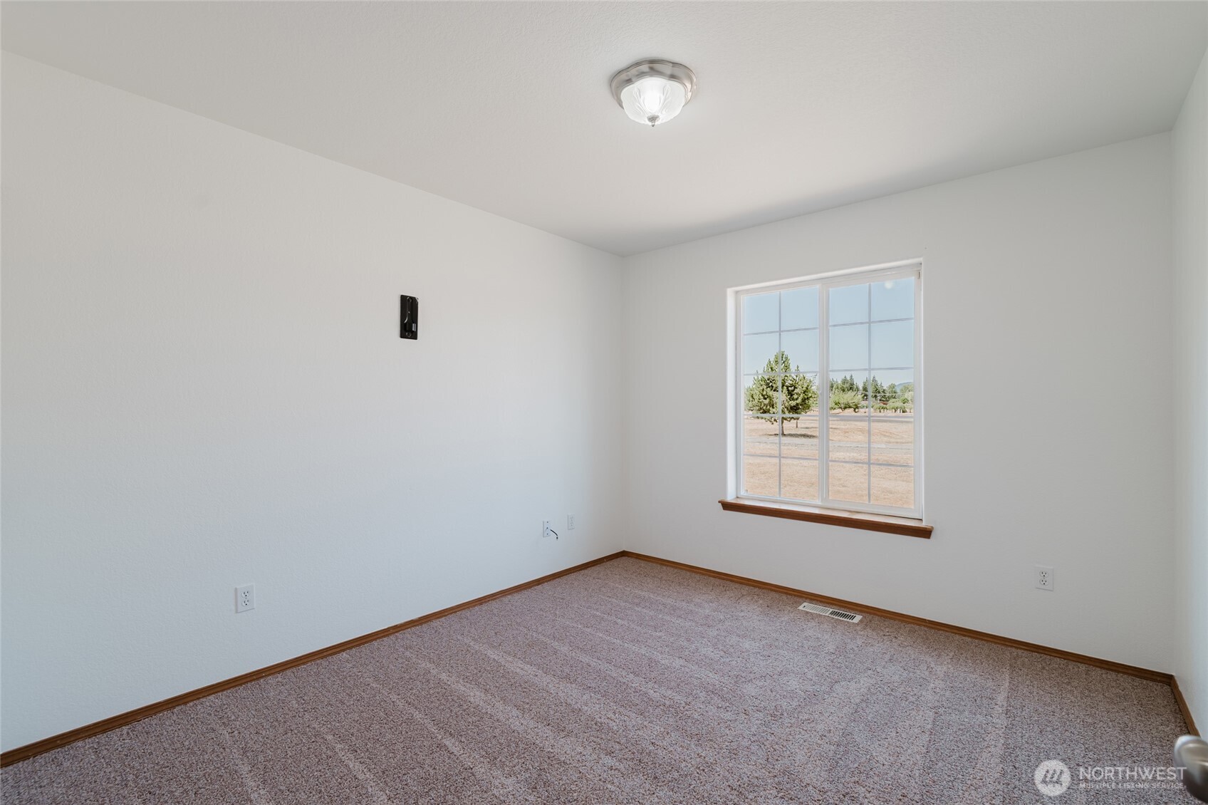 9519 184th Avenue Southwest Rochester, WA 98579 - Photo 25 of 38 an empty room with windows