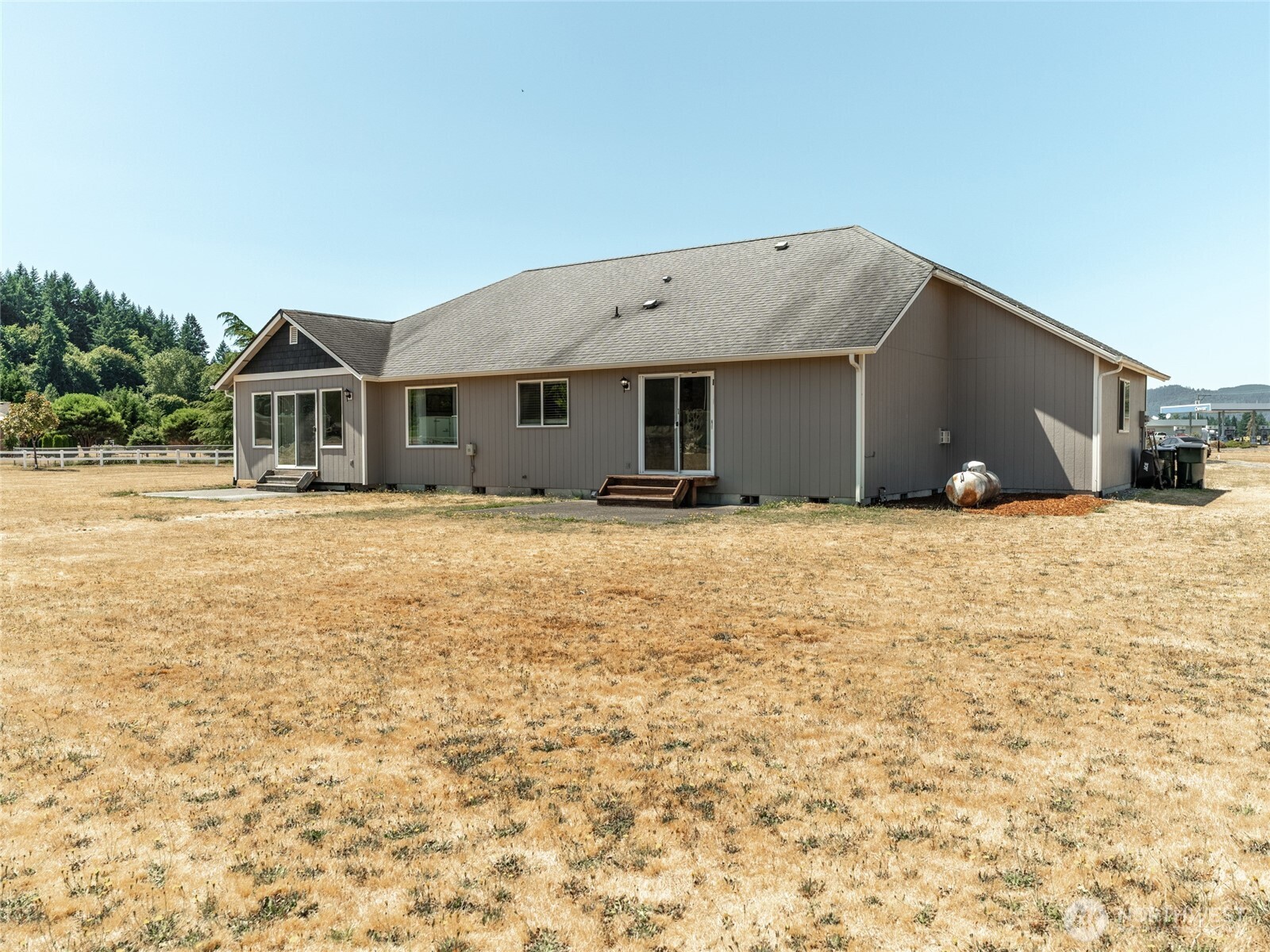 9519 184th Avenue Southwest Rochester, WA 98579 - Photo 28 of 38 a front view of a house with a yard