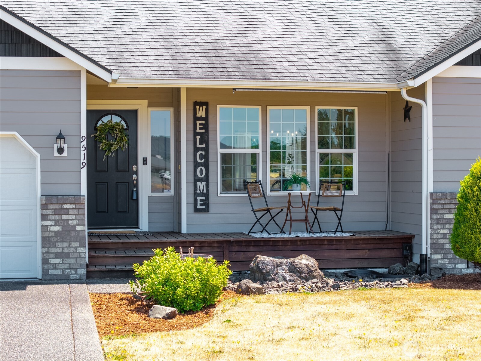9519 184th Avenue Southwest Rochester, WA 98579 - Photo 3 of 38 a view of a house with potted plants