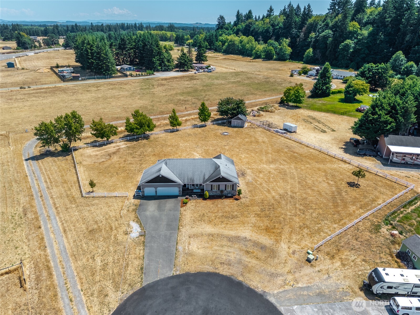 9519 184th Avenue Southwest Rochester, WA 98579 - Photo 33 of 38 an aerial view of a house with a yard and ocean view