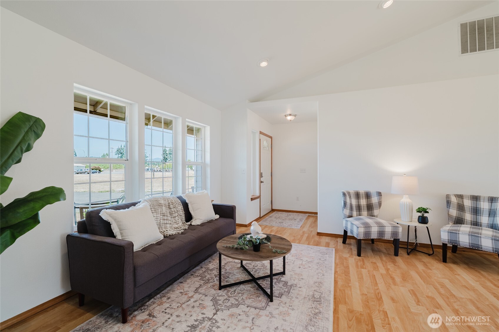 9519 184th Avenue Southwest Rochester, WA 98579 - Photo 5 of 38 a living room with furniture and a wooden floor