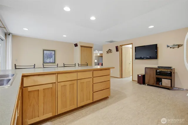 a bedroom with a bed and a desk