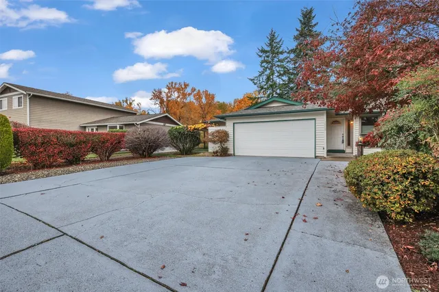 a view of front door and yard