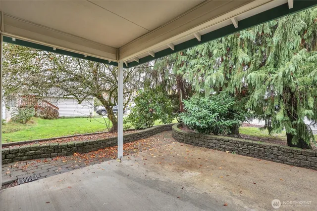 a view of a porch with a yard