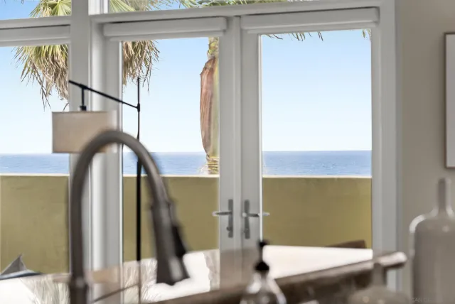 a bathroom with a toilet a sink and a mirror