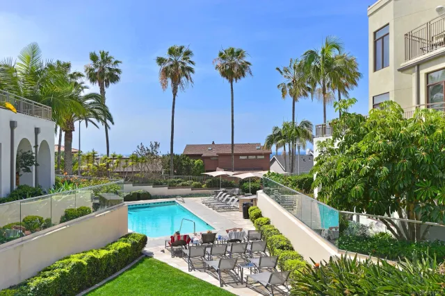 a view of a yard with table and chairs