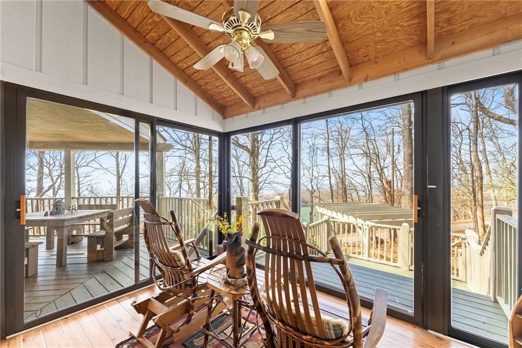 28 Little Hendricks Mountain Road Jasper, GA 30143 - Photo 11 of 50 a view of a dining room with furniture water view and balcony
